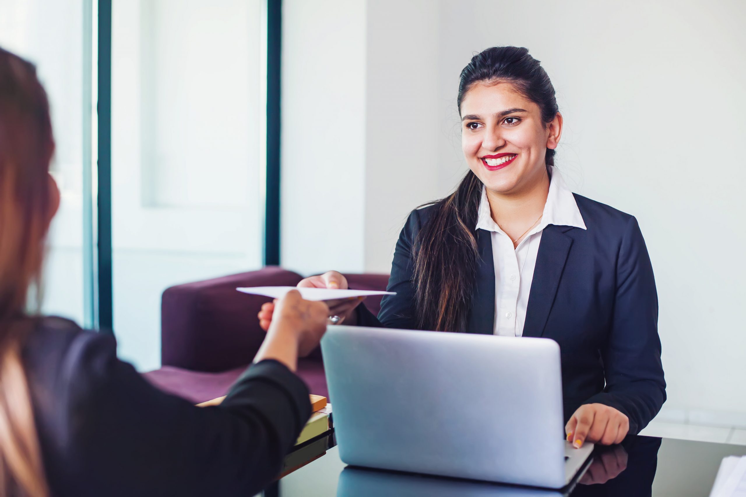 indian-woman-working-bank-as-relationship-manager-issuing-loan-approval-customer